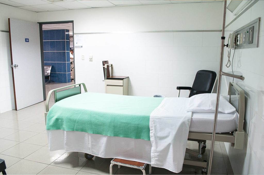 Clean hospital bed in preparation for a Medicare audit