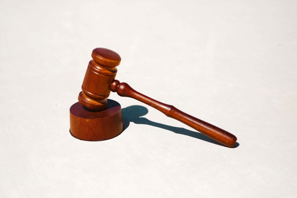 A gavel being used during a defense against medical practice frivolous lawsuits