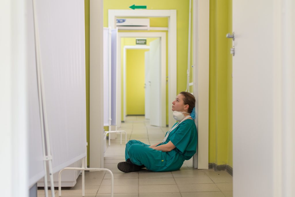 A nurse contemplating how to get her nursing license back after suspension